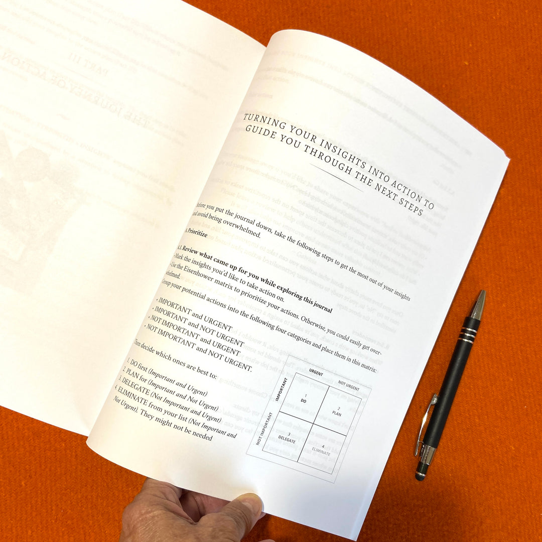 Awaken_Your_Introvert_Strengths_Self-Coaching_Journal - action plan section - and a pen on an orange surface