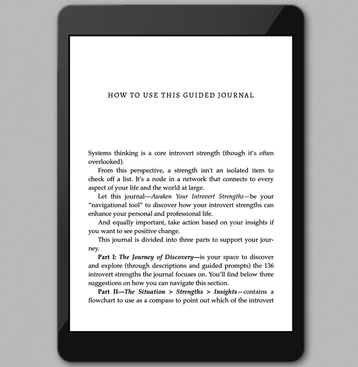 Digital tablet displaying "How to Use This Guided Journal" of Awaken Your Introvert Strengths ebook on a gray background
