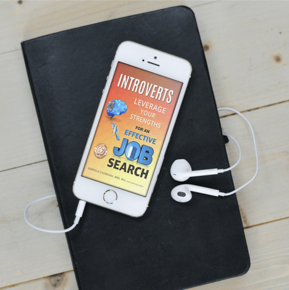phone with Introverts Leverage Your Strengths for an Effective Job Search earplugs on a black notebook