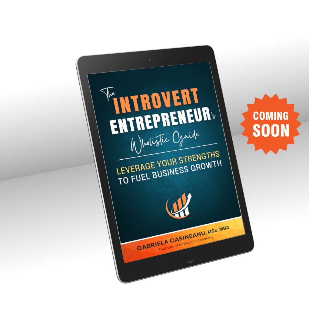 A tablet with the cover of the book 'The Introvert Entrepreneur's Wholistic Guide: Leverage Your Strengths to Fuel Business Growth' by Gabriela Casineanu, with a 'Coming Soon' badge.